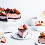 No Bake Chocolate Strawberry Cheesecake topped with fresh strawberries