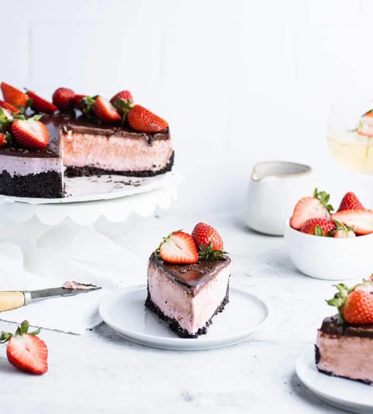 No Bake Chocolate Strawberry Cheesecake topped with fresh strawberries