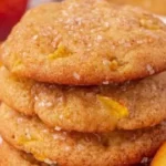 Freshly baked peach cookies on a plate, ready to enjoy