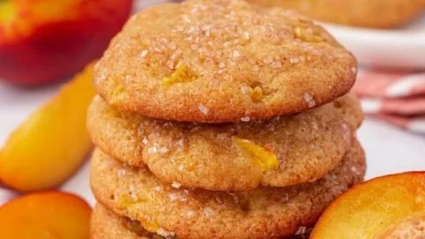 Freshly baked peach cookies on a plate, ready to enjoy